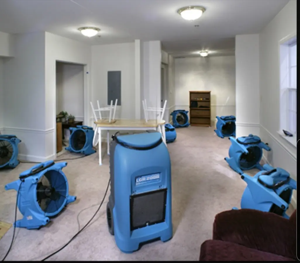 Air movers and dehumidifier setup for Water Damage Restoration in Antigo